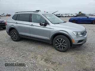 2021 Volkswagen Tiguan SE with VIN 3VV3B7AX8MM058499, listed as a Copart auction lot 57127595 with 78,141 mi miles and Salvage title. Bid and sale history available at DreamBid. Image 4.