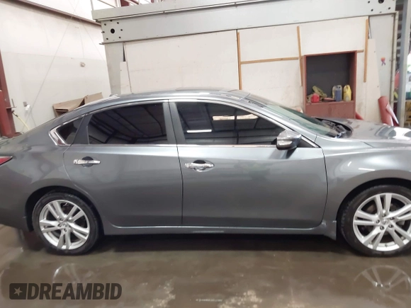 2014 Nissan Altima SL with VIN 1N4BL3AP0EC199270, listed as a IAAI auction lot 42069952 with 94,402 mi miles and . Bid and sale history available at DreamBid. Image 13.