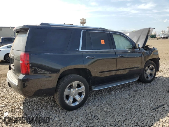 2015 Chevrolet Tahoe LTZ with VIN 1GNSKCKC2FR289034, listed as a Copart auction lot 57067225 with Not provided miles and Salvage title. Bid and sale history available at DreamBid. Image 3.