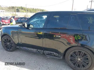 2023 Land Rover Range Rover SE z VIN SALKP9E71PA059957, wystawiony jako IAAI lot #41337686 z przebiegiem Nie podano mil oraz . Historia ofert i sprzedaży dostępna na DreamBid. Obrazek 6.
