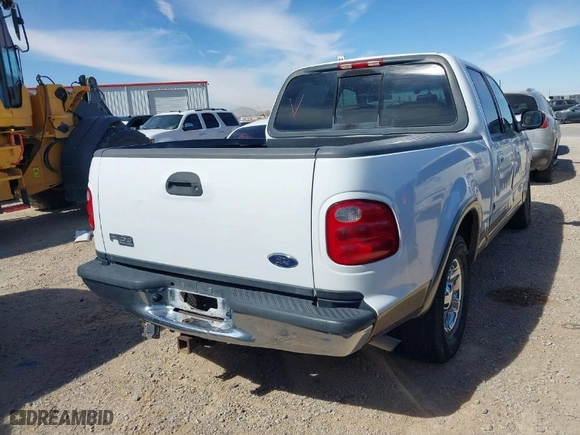 2002 Ford F-150 XLT with VIN 1FTRW07L92KC55405, listed as a IAAI auction lot 41645797 with 198,211 mi miles. Bid and sale history available at carsss.com. Image 4.