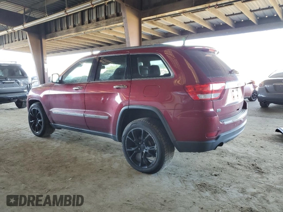 2013 Jeep Grand Cherokee Overland with VIN 1C4RJECT6DC526743, listed as a Copart auction lot 50203065 with 186,673 mi miles and Salvage Title. Bid and sale history available at DreamBid. Image 2.