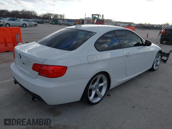2013 BMW 3 Series 335i with VIN WBAKG7C53DJ438190, listed as a IAAI auction lot 41712275 with 126,357 mi miles. Bid and sale history available at carsss.com. Image 4.