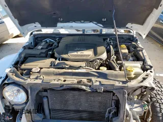 2016 Jeep Wrangler Unlimited Sahara z VIN 1C4HJWEG6GL218719, wystawiony jako Copart lot #56065235 z przebiegiem 96 061 mil mil oraz Szkoda całkowita • Salvage title. Historia ofert i sprzedaży dostępna na DreamBid. Obrazek 12.