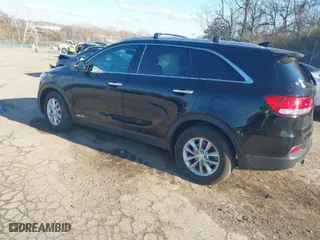 2016 Kia Sorento LX with VIN 5XYPGDA54GG019084, listed as a IAAI auction lot 40985459 with 148,743 mi miles. Bid and sale history available at carsss.com. Image 3.