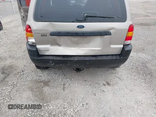2001 Ford Escape with VIN 1FMUU01B61KE00524, listed as a IAAI auction lot 41486950 with 163,753 mi miles and . Bid and sale history available at DreamBid. Image 6.