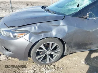 2018 Nissan Maxima SL z VIN 1N4AA6AP2JC378066, wystawiony jako IAAI lot #41764723 z przebiegiem 101 620 mil mil oraz . Historia ofert i sprzedaży dostępna na DreamBid. Obrazek 6.