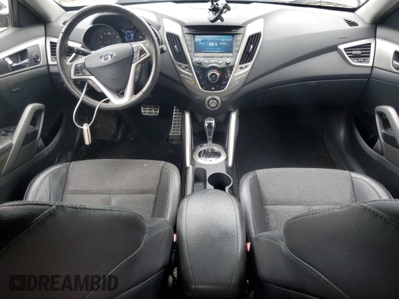 2013 Hyundai Veloster w/Gray Int z VIN KMHTC6AD2DU106887, wystawiony jako Copart lot #58149635 z przebiegiem 159 914 mil mil oraz Szkoda całkowita • Salvage title. Historia ofert i sprzedaży dostępna na DreamBid. Obrazek 8.