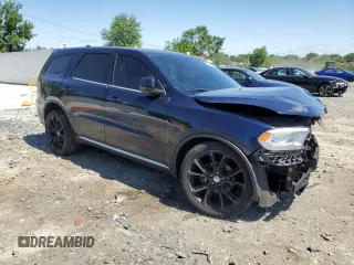 2018 Dodge Durango SXT with VIN 1C4RDJAG4JC161335, listed as a Copart auction lot 57243095 with 74,690 mi miles and Salvage title. Bid and sale history available at DreamBid. Image 4.