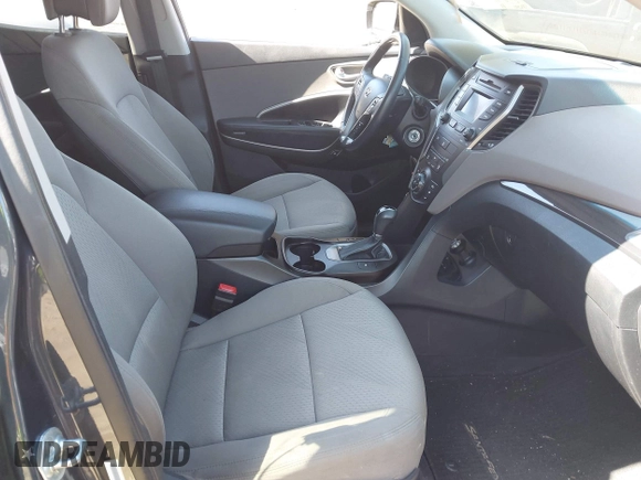 2014 Hyundai Santa Fe z VIN 5XYZUDLB1EG165458, wystawiony jako IAAI lot #42107789 z przebiegiem 94 395 mil mil oraz . Historia ofert i sprzedaży dostępna na DreamBid. Obrazek 5.
