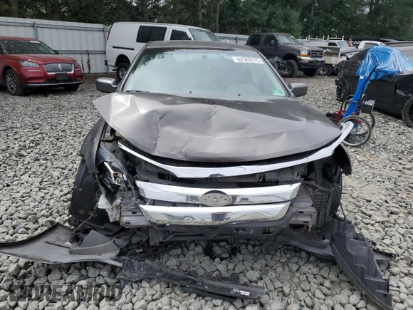 2012 Ford Fusion SE with VIN 3FAHP0HA0CR355529, listed as a Copart auction lot 62585515 with 113,094 mi miles and Salvage title. Bid and sale history available at DreamBid. Image 5.