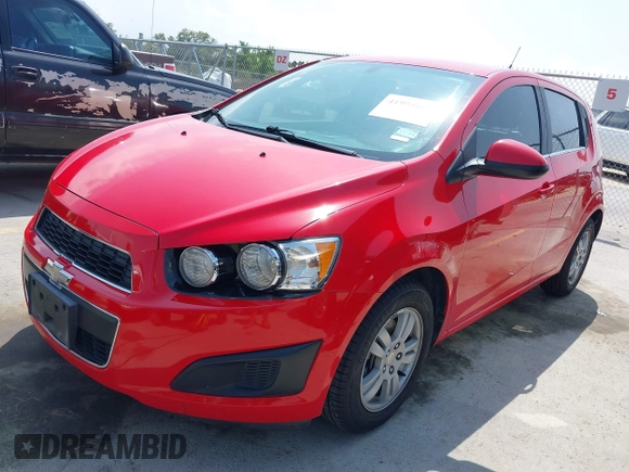 2014 Chevrolet Sonic LT with VIN 1G1JC6SH7E4135650, listed as a IAAI auction lot 41954694 with 103,944 mi miles. Bid and sale history available at carsss.com. Image 2.