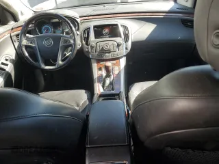 2013 Buick LaCrosse Leather z VIN 1G4GC5E33DF270943, wystawiony jako Copart lot #61810135 z przebiegiem 140 821 mil mil oraz Szkoda całkowita • Salvage title. Historia ofert i sprzedaży dostępna na DreamBid. Obrazek 8.
