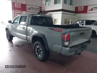 2021 Toyota Tacoma SR5 z VIN 3TMDZ5BN5MM114494, wystawiony jako IAAI lot #41723032 z przebiegiem 54 477 mil mil oraz . Historia ofert i sprzedaży dostępna na DreamBid. Obrazek 3.