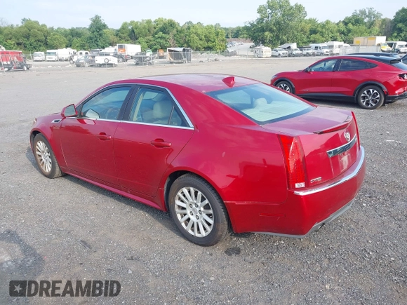 2011 Cadillac CTS Luxury with VIN 1G6DE5EY1B0171215, listed as a IAAI auction lot 42802832 with 179,143 mi miles and . Bid and sale history available at DreamBid. Image 3.