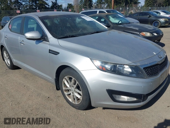 2013 Kia Optima LX z VIN KNAGM4A74D5371383, wystawiony jako IAAI lot #41756449 z przebiegiem 133 002 mil mil oraz . Historia ofert i sprzedaży dostępna na DreamBid. Obrazek 1.