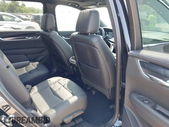 2021 Cadillac XT6 Premium Luxury with VIN 1GYKPDRS0MZ153523, listed as a IAAI auction lot 42770895 with 19,843 mi miles and . Bid and sale history available at DreamBid. Image 8.