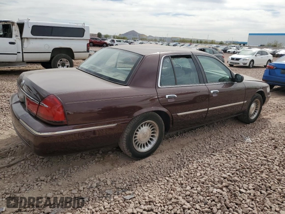 2001 Mercury Grand Marquis LS с VIN 2MEFM75W81X667940, выставлен на аукционе Copart как лот 48027015 с пробегом 121 967 миль миль и Списание • Salvage title. История ставок и продаж доступна на DreamBid. Изображение 3.
