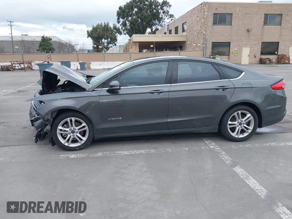 2018 Ford Fusion SE z VIN 3FA6P0LU8JR195096, wystawiony jako IAAI lot #41494088 z przebiegiem 114 007 mil mil oraz . Historia ofert i sprzedaży dostępna na DreamBid. Obrazek 15.