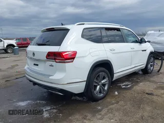 2019 Volkswagen Atlas SEL R-Line with VIN 1V2RR2CA6KC594588, listed as a IAAI auction lot 41686713 with 125,180 mi miles and . Bid and sale history available at DreamBid. Image 4.
