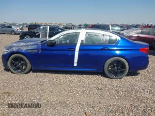 2018 BMW M5 z VIN WBSJF0C53JB282658, wystawiony jako IAAI lot #39977648 z przebiegiem 28 001 mil mil oraz . Historia ofert i sprzedaży dostępna na DreamBid. Obrazek 14.