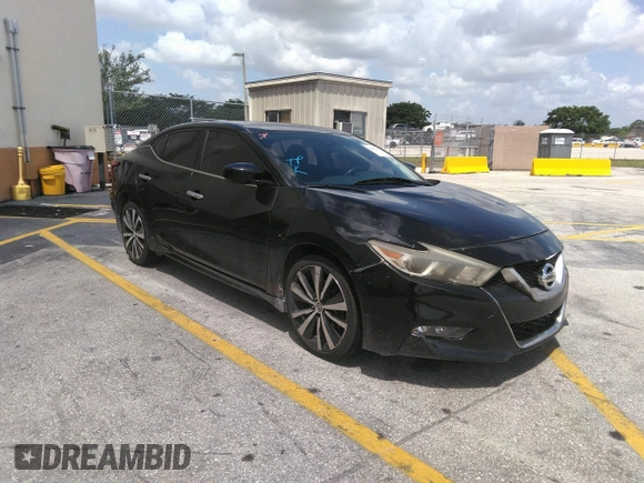 2016 Nissan Maxima SR with VIN 1N4AA6AP9GC428938, listed as a IAAI auction lot 42419663 with 121,501 mi miles and . Bid and sale history available at DreamBid. Image 1.