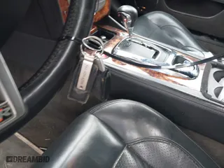 2008 Jaguar XK with VIN SAJWA43C889B21570, listed as a IAAI auction lot 42082547 with 99,783 mi miles. Bid and sale history available at carsss.com. Image 11.