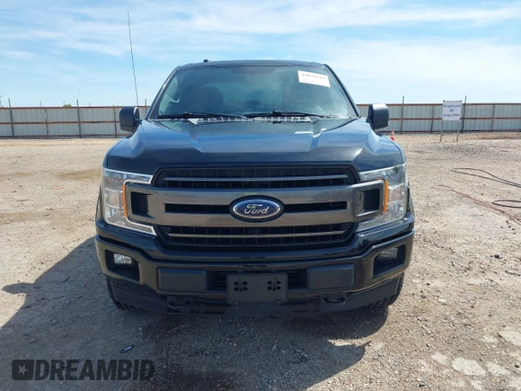 2018 Ford F-150 XL with VIN 1FTEX1EP7JFC21008, listed as a IAAI auction lot 42072145 with 102,679 mi miles and . Bid and sale history available at DreamBid. Image 12.