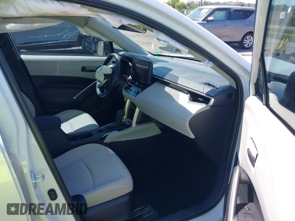 2023 Toyota Corolla Cross L with VIN 7MUAAAAG9PV040481, listed as a IAAI auction lot 42059462 with 8,891 mi miles and . Bid and sale history available at DreamBid. Image 5.
