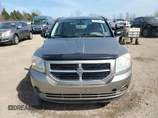 2007 Dodge Caliber SXT with VIN 1B3HB48B27D263783, listed as a Copart auction lot 53116575 with 164,533 mi miles and Salvage Title. Bid and sale history available at DreamBid. Image 5.