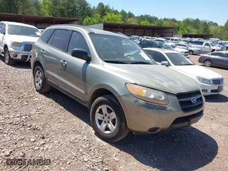 2009 Hyundai Santa Fe GLS with VIN 5NMSG13D19H331269, listed as a IAAI auction lot 42005021 with 120,215 mi miles. Bid and sale history available at carsss.com. Image 1.