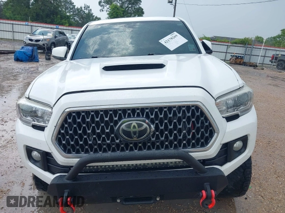2019 Toyota Tacoma SR z VIN 3TMCZ5AN0KM232852, wystawiony jako IAAI lot #42178269 z przebiegiem 71 545 mil mil oraz . Historia ofert i sprzedaży dostępna na DreamBid. Obrazek 12.