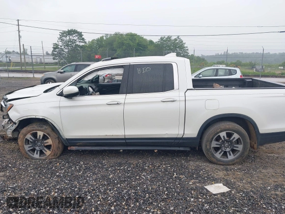 2018 Honda Ridgeline RTL-E with VIN 5FPYK3F77JB017293, listed as a IAAI auction lot 42422614 with 87,700 mi miles and . Bid and sale history available at DreamBid. Image 14.