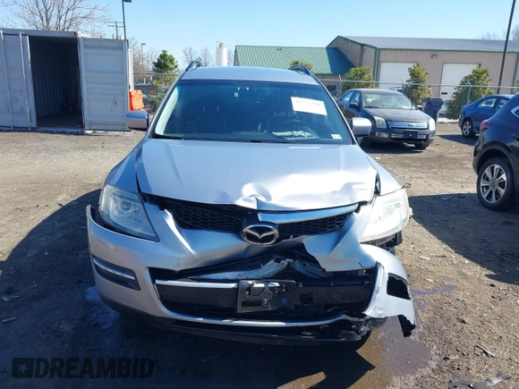 2008 Mazda CX-9 Grand Touring z VIN JM3TB38A780159798, wystawiony jako IAAI lot #41775580 z przebiegiem 119 147 mil mil oraz . Historia ofert i sprzedaży dostępna na DreamBid. Obrazek 12.