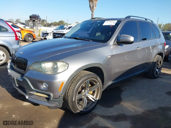 2009 BMW X5 30i with VIN 5UXFE43559L263332, listed as a IAAI auction lot 41998651 with 209,264 mi miles. Bid and sale history available at carsss.com. Image 2.