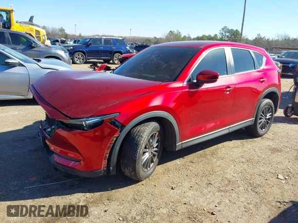 2019 Mazda CX-5 Sport with VIN JM3KFBBM2K0508743, listed as a IAAI auction lot 41288659 with 77,710 mi miles and . Bid and sale history available at DreamBid. Image 2.