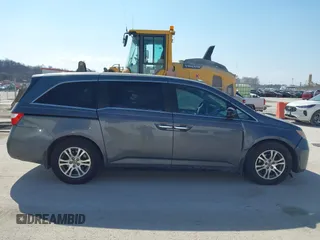 2012 Honda Odyssey EX-L with VIN 5FNRL5H69CB128585, listed as a IAAI auction lot 41695109 with 231,565 mi miles and . Bid and sale history available at carsss.com. Image 13.