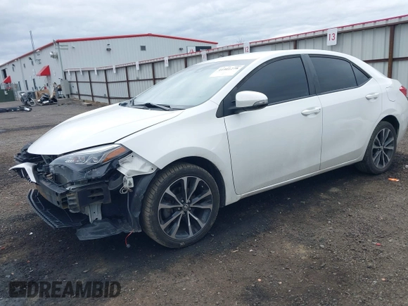 2019 Toyota Corolla L with VIN 5YFBURHE1KP937059, listed as a IAAI auction lot 41901278 with 98,796 mi miles and . Bid and sale history available at DreamBid. Image 18.
