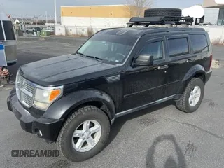 2008 Dodge Nitro SLT z VIN 1D8GU58K68W145253, wystawiony jako Copart lot #43768705 z przebiegiem 167 904 mil mil oraz Czysty tytuł • Clean title. Historia ofert i sprzedaży dostępna na DreamBid. Obrazek 2.