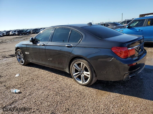 2012 BMW 7 Series 750i with VIN WBAKA8C54CDX01386, listed as a Copart auction lot 82404214 with 0 miles and Clean Title. Bid and sale history available at carsss.com. Image 2.