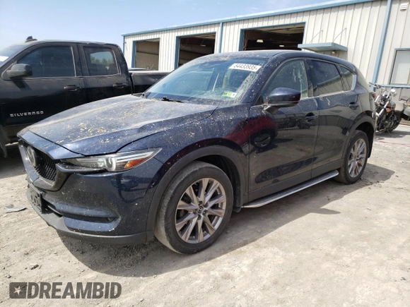 2020 Mazda CX-5 Grand Touring with VIN JM3KFBDM0L0767634, listed as a Copart auction lot 54433935 with 57,901 mi miles and Salvage Title. Bid and sale history available at carsss.com. Image 1.