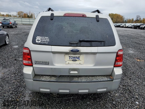 2012 Ford Escape XLT с VIN 1FMCU0D73CKB55395, выставлен на аукционе Copart как лот 80398044 с пробегом 159 656 миль миль и Списание • Salvage title. История ставок и продаж доступна на DreamBid. Изображение 6.