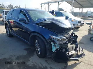 2019 Mazda CX-9 Touring with VIN JM3TCACY8K0315909, listed as a IAAI auction lot 42655699 with 78,134 mi miles and . Bid and sale history available at DreamBid. Image 1.