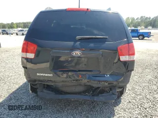 2009 Kia Borrego LX with VIN KNDJJ741395020692, listed as a Copart auction lot 52730975 with 217,861 mi miles and Salvage Title. Bid and sale history available at carsss.com. Image 6.