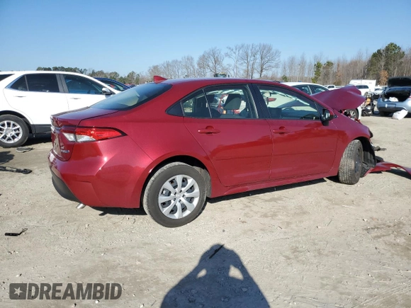 2023 Toyota Corolla Hybrid LE with VIN JTDBCMFE1PJ013094, listed as a Copart auction lot 47686665 with 27,190 mi miles and Salvage Title. Bid and sale history available at carsss.com. Image 3.