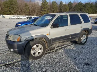 2004 Mazda Tribute LX with VIN 4F2YZ04164KM17516, listed as a Copart auction lot 45364695 with 172,855 mi miles and Salvage Title. Bid and sale history available at DreamBid. Image 1.