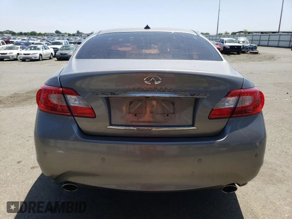 2013 Infiniti M with VIN JN1BY1AP2DM511973, listed as a Copart auction lot 55351815 with 126,888 mi miles and Salvage title. Bid and sale history available at DreamBid. Image 6.
