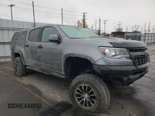 2018 Chevrolet Colorado 4WD ZR2 with VIN 1GCPTEE17J1211308, listed as a Copart auction lot 81398054 with 135,350 mi miles and Salvage Title. Bid and sale history available at carsss.com. Image 4.