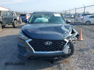 2019 Hyundai Tucson SE with VIN KM8J23A4XKU932814, listed as a IAAI auction lot 40968319 with 107,365 mi miles. Bid and sale history available at carsss.com. Image 12.