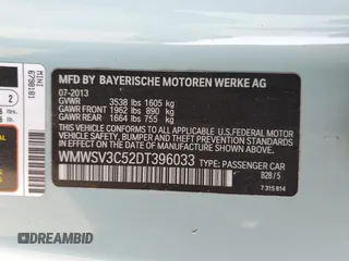 2013 MINI Hardtop S with VIN WMWSV3C52DT396033, listed as a Copart auction lot 61041585 with 83,873 mi miles and Salvage title. Bid and sale history available at DreamBid. Image 12.